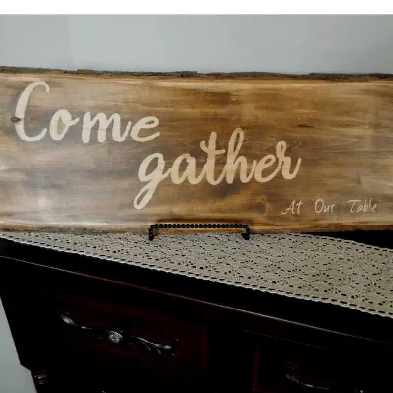 A sign that reads come gather.