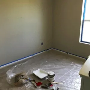 Bedroom that is prepped to be painted.