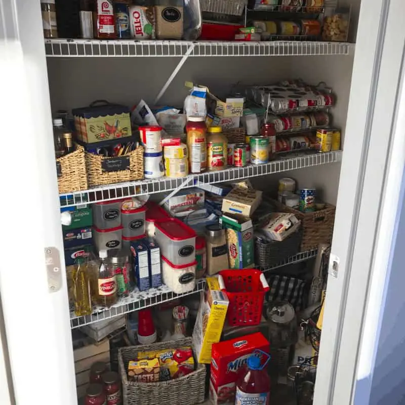 A pantry that is filled with food.