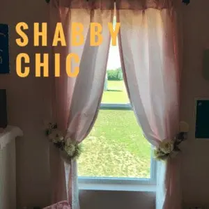 Pink curtains that have flowers for tie backs and the word Shabby Chic at the top of the picture.