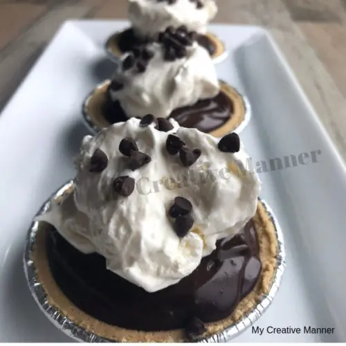 Three Mini Chocolate Pies on a plate.
