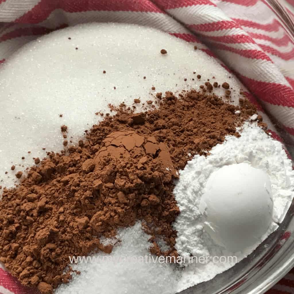The dry ingredients for a crockpot chocolate cake recipe.