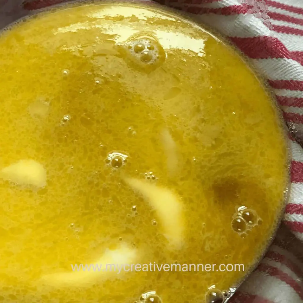 The wet ingredients in a bowl for chocolate molten lava cake.