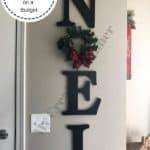 Wood Letters and mini wreath that spell out Noel.