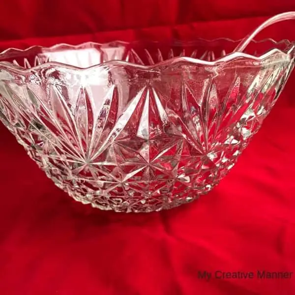 Class punch bowl with ladle.