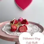 Valentine Cake Balls on a pink cake stand.