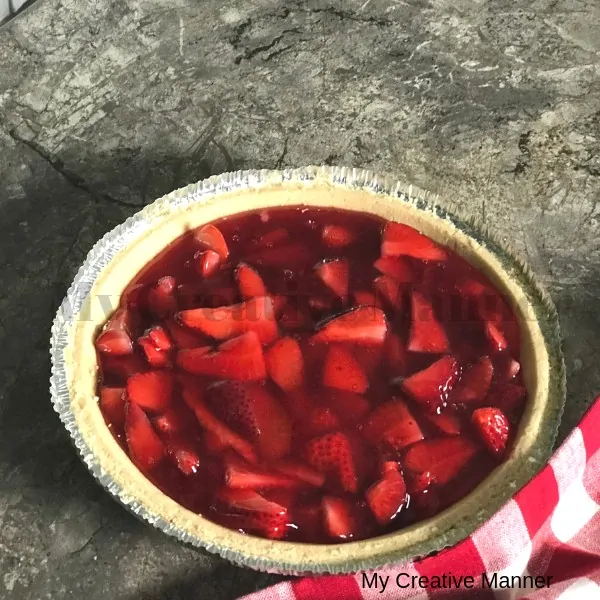 Strawberry Pie with a red and white napkin.