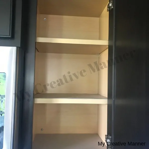 Picture of an empty cupboard.