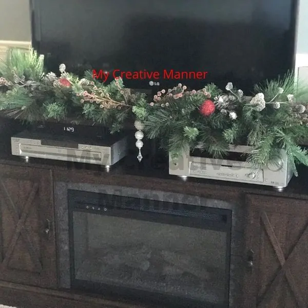 Garland on a tv stand.