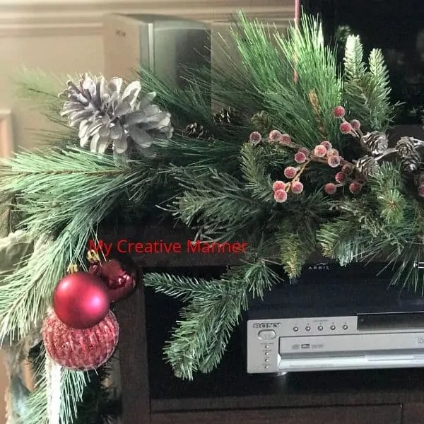 Garland on a tv stand.