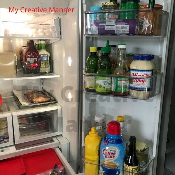 The inside of a refrigerator door that has been organized.
