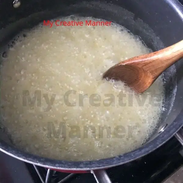 The melted batter for peanut butter oatmel no bake cookies being boiled.