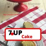 7-Up Cake on a white plate and red cake stand. WIth the words 7.UP Cake in a white and red box.