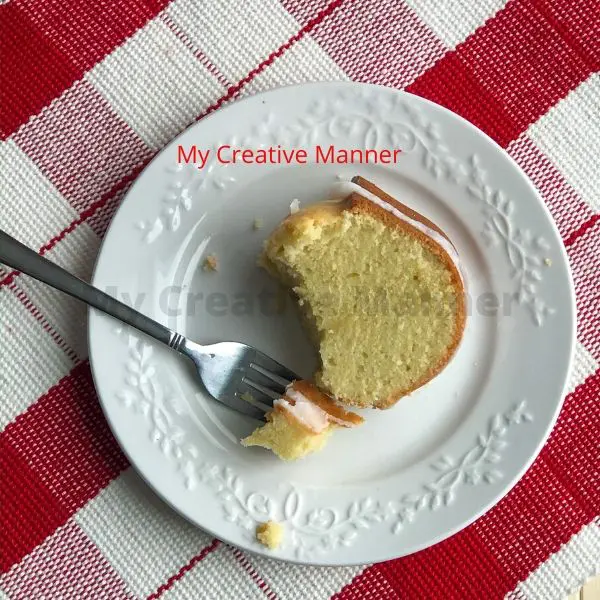 Lemon pound cake on a white plate.