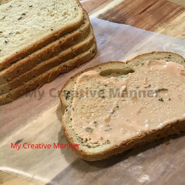 Bread that has salad dressing on it for a grilled sandwich.