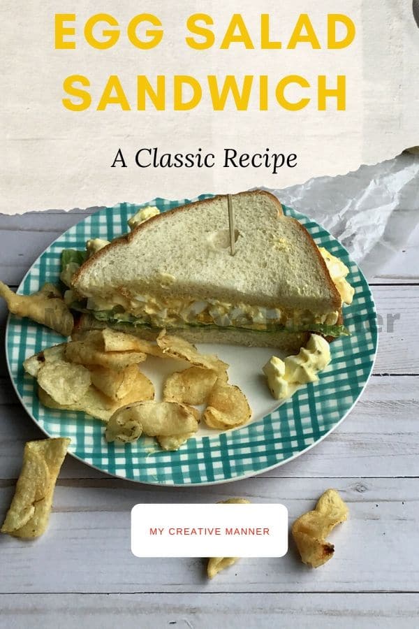 Egg Salad Sandwich with chips on a plate.