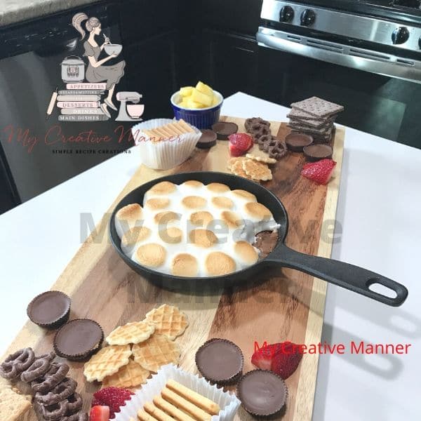 S'mores dessert  board filled with a lot of goodies.