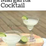 Two Margaritas in classes on a wood board.