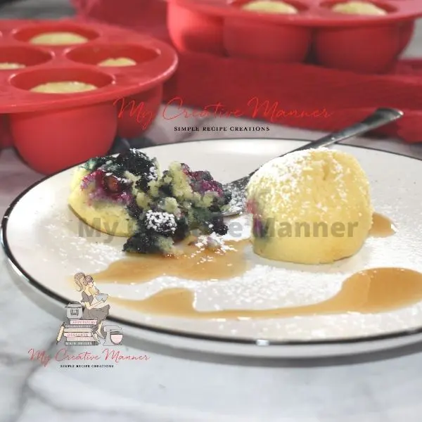 Blueberry pancake bites on a plate.