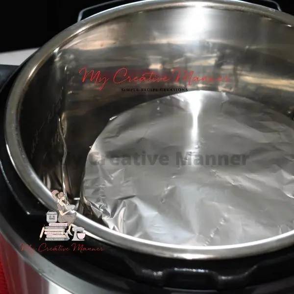 The foiled covered bites in the inner pot of the Instant Pot.