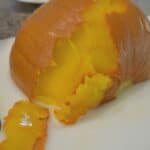 The skin of the pie pumpkin being removed for homemade pumpkin puree.