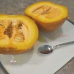 A pie pumpkin cut in half that was cooked in an Instant Pot for pumpkin puree.