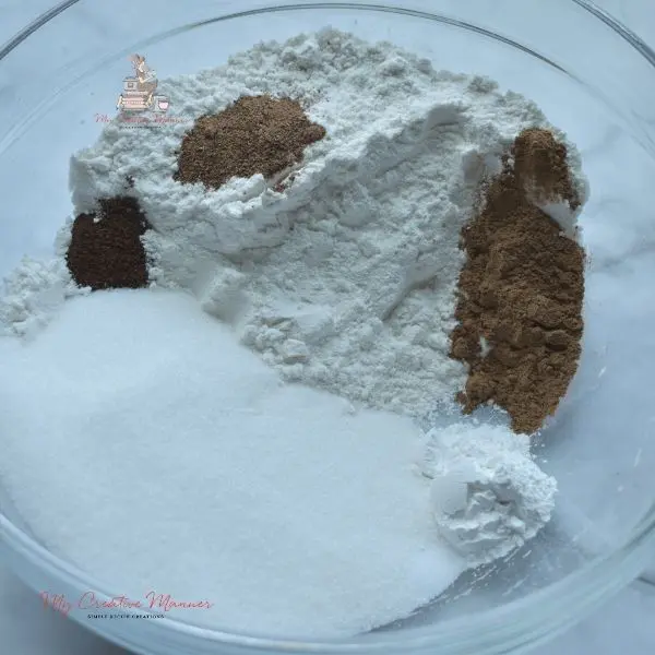 Flour, sugar, and spice in a mixing bowl.