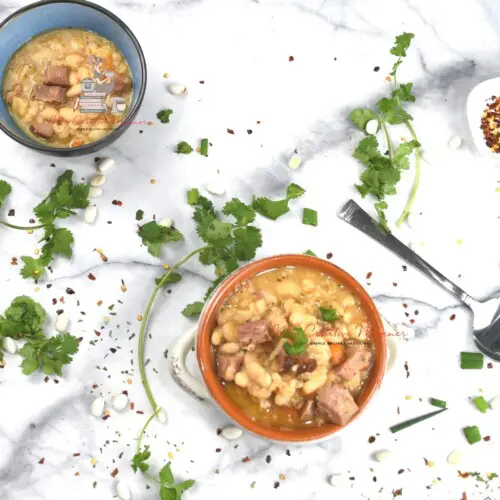Two bowls of ham and bean soup that was made in the crockpot.