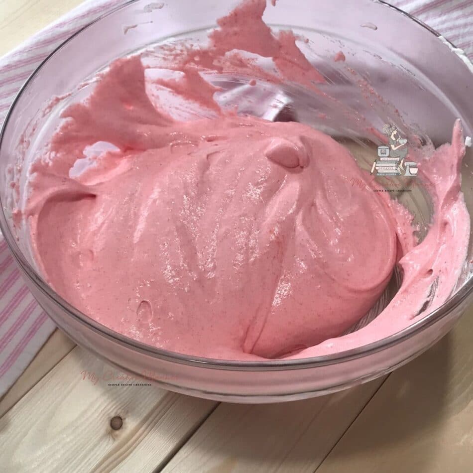 Strawberry cool whip in a bowl.