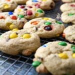 M&M Cookies on a cooling rack.