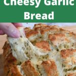 The words pull apart cheesy garlic bread on the top of the image. At the bottom of the image is fingers pulling from a piece from the cheesy bread recipe.