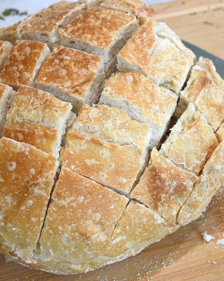 A sourdough that has been sliced into 1-inch cubes for the cheese and garlic crack bread.