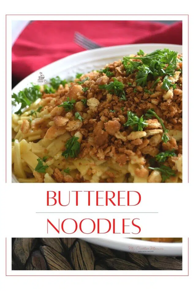 A bowl filled with pasta with a crumb topping.