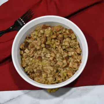 A baking dish that is full of stuffing that was made in the Instant Pot.