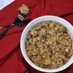 A dish with the homemade dressing that is made with a stuffing mix.