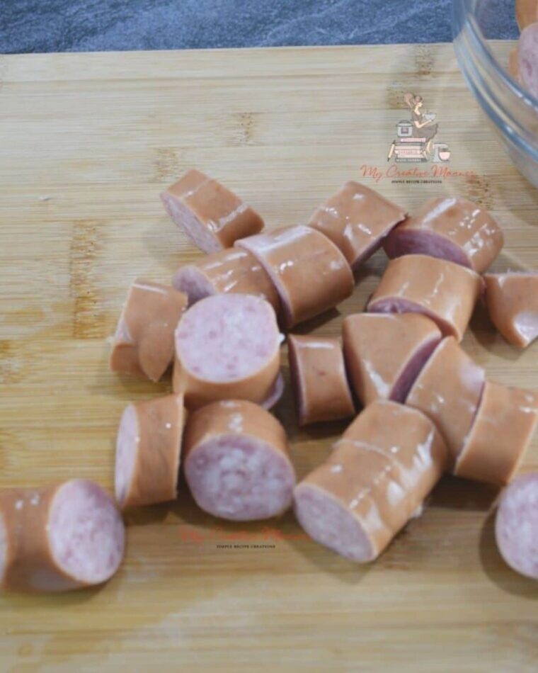 Kielbasa sausage cut into chunks that will be cooked in the slow cooker.