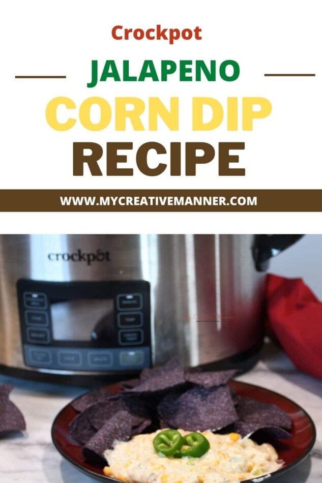 A slow cooker is in the backgroun dwith a plate that has chips and corn dip on it.