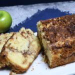A loaf of cinnamon apple bread that has been sliced.