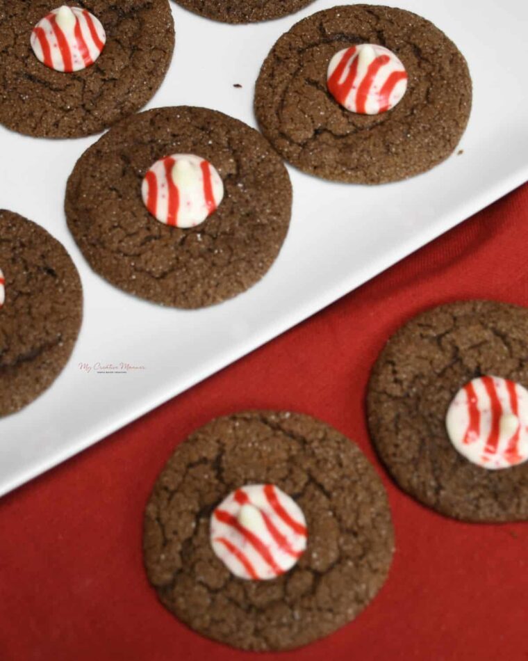Overhead shot of the peppermint kiss chocolate cookies on a plate.