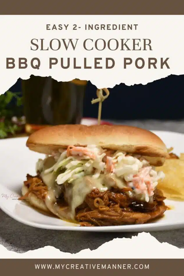 Pork on a bun that is topped with cheese and coleslaw, the words easy 2 ingredient slow cooker bbq pulled pork are at the top of the image.