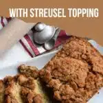 Bread that has been sliced on a plate with the words delicious banana bread with streusel topping above the image.