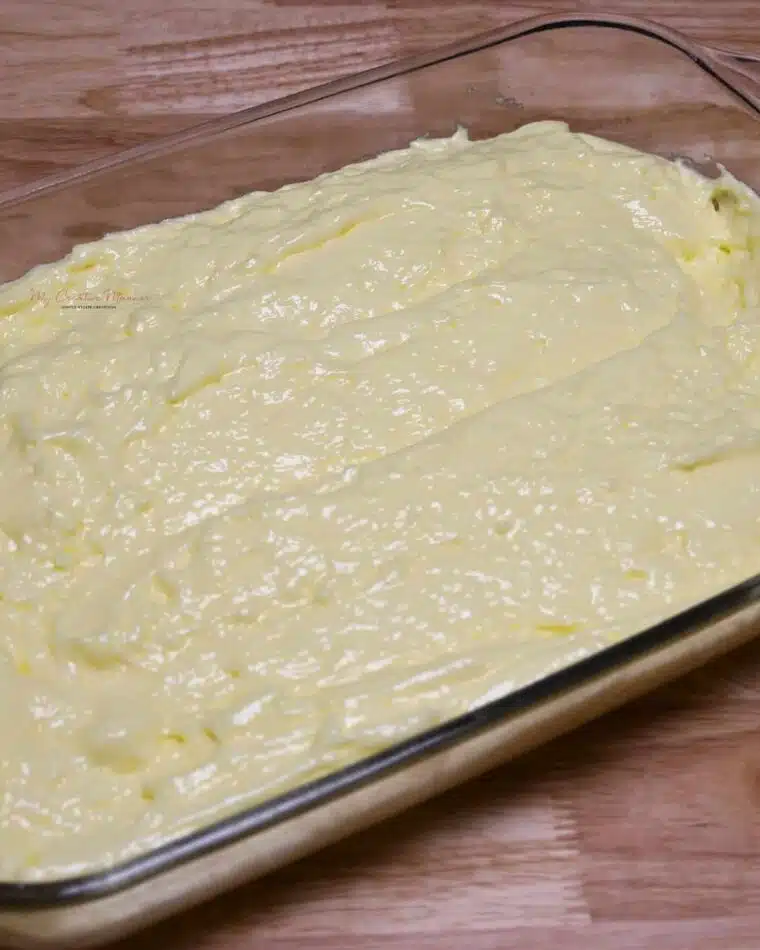 A baking dish with the unbaked lemon bars in it.