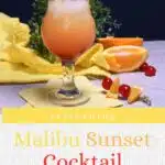 A glass filled with a Malibu sunset drink that is garnished with oranges and cherries.