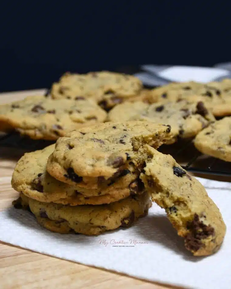 A closeup of a stack of Chocolate chip cookies with Oreo's.