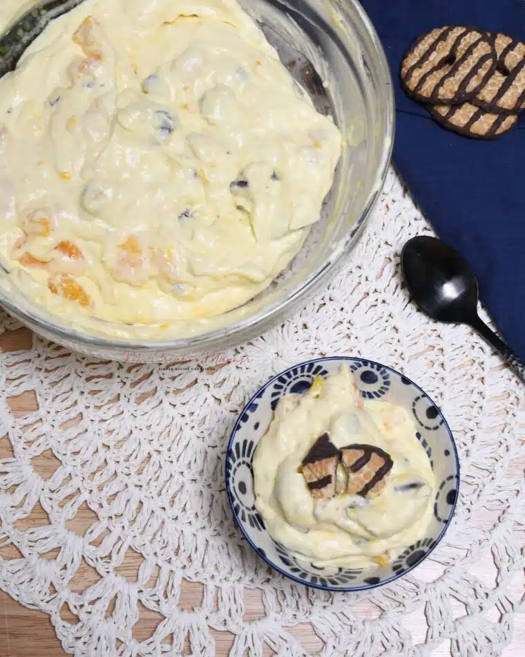 Overhead image of a large and small bowl that are filled with the fudge stripe cookie recipe.