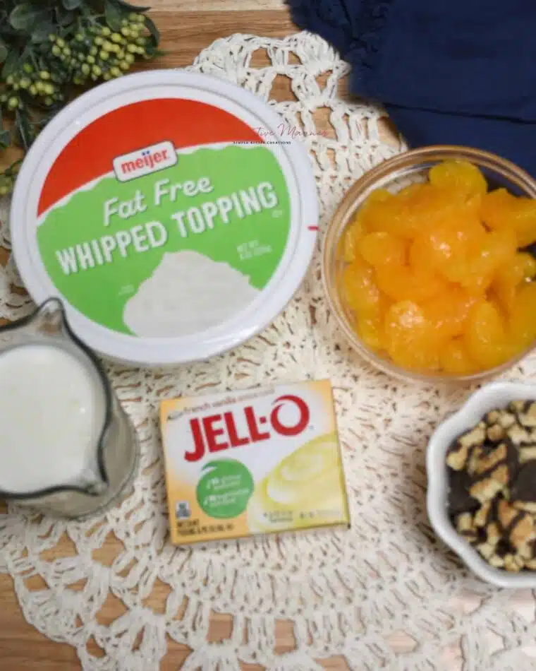 Overhead image of the ingredients needed to make this cookie salad that is made with cool whip.