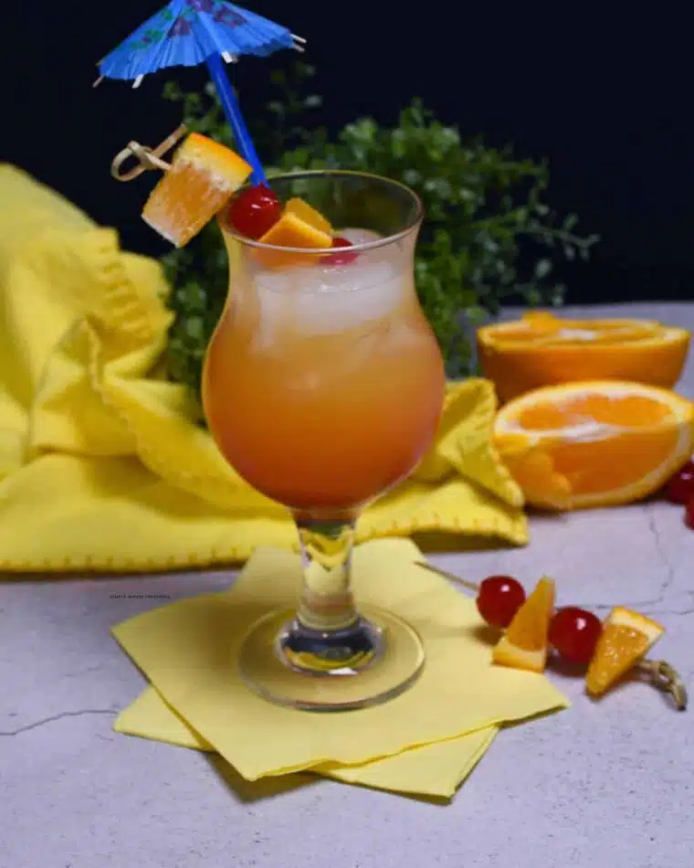 Close up of the cocktail glass filled with the sunset drink.