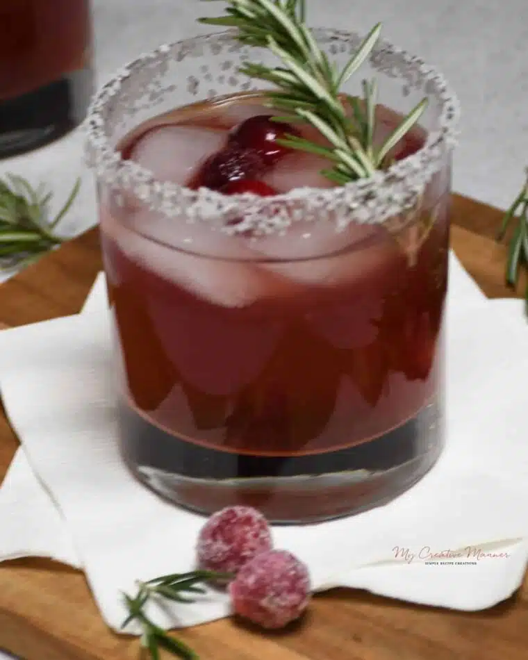 Overhead image of a glass filled with a cranberry bliss infusion margarita.