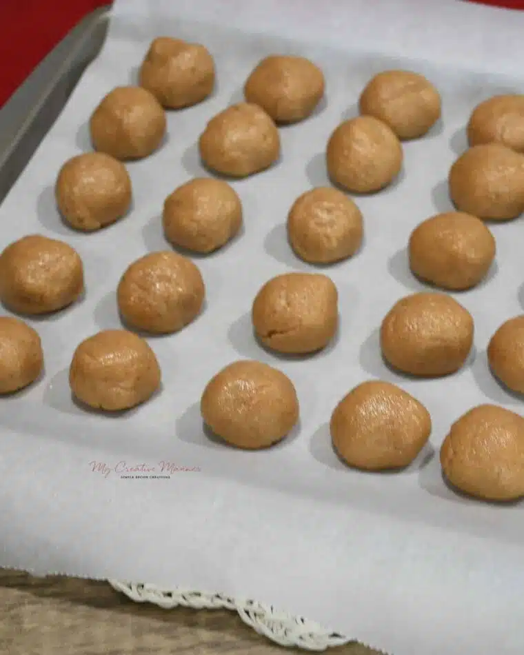 Snickerdoodle truffles on a sheet pan before they have been dipped in chocolate.