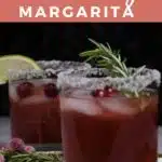 The words Cranberry Margarita are at the top of the image with two glass that are filled with the cocktail.